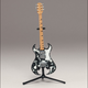 Illustration for article titled McFarlanes Tiny, Plastic Guitar Hero Guitars